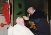 Archie Clark having a haircut by Martin Dunn in Colintraive Hotel